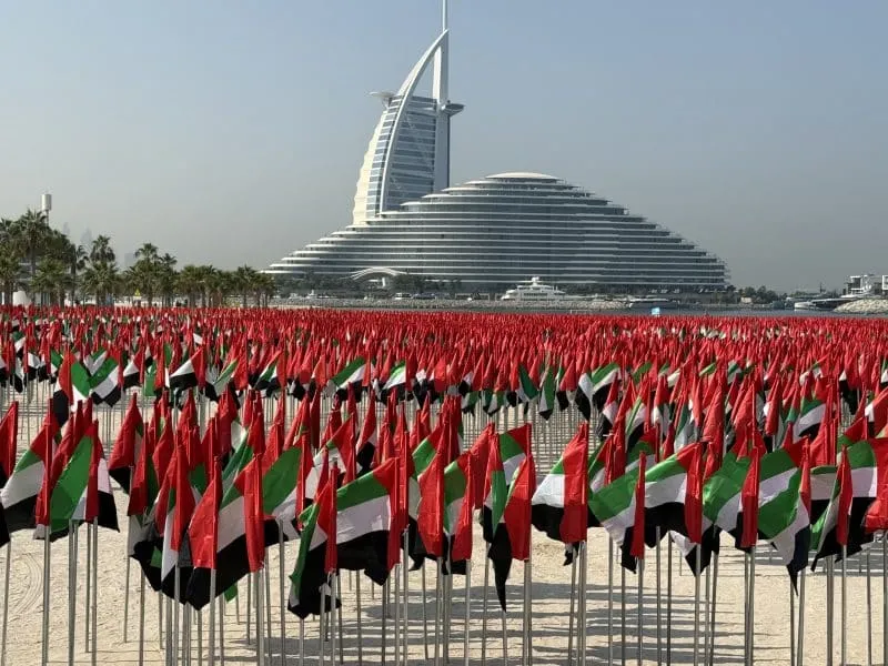 UAE Flag Garden Dubai Flag Garden 2025 Umm Suqeim Beach UAE national celebrations UAE Flag Day UAE National Day Brand Dubai attractions in Dubai Burj Al Arab Jumeirah Al Marsa free things to do in Dubai UAE tourism national pride events in UAE aerial portraits UAE founding fathers Sheikh Zayed Sheikh Rashid Dubai winter attractions family friendly Dubai outdoor activities Instagram spots Dubai cultural celebration UAE weekend plans flag installation Dubai landmarks UAE events October events Dubai November events Dubai