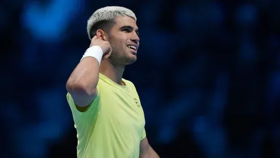 Carlos Alcaraz ATP Finals 2025 Alcaraz Fritz match Alcaraz World No 1 ranking ATP Finals Turin Alcaraz vs Fritz highlights Carlos Alcaraz victory Alcaraz semifinal spot ATP Finals Jimmy Connors group Alcaraz Musetti match Alcaraz tennis news Alcaraz year end ranking Taylor Fritz knee injury ATP Finals results Alcaraz comeback win Alcaraz Spain tennis ATP Finals 2025 scores ATP Finals semifinal lineup Alcaraz match stats Lorenzo Musetti ATP Finals Novak Djokovic withdrawal Jannik Sinner ATP Finals Felix Auger Aliassime Alcaraz tennis performance ATP Finals 2025 updates ATP Finals day 3 Alcaraz World No 1 race