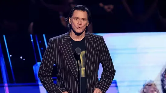 Jim Carrey Taylor Momsen Grinch reunion How the Grinch Stole Christmas Cindy Lou Who Rock and Roll Hall of Fame Jim Carrey news Taylor Momsen news Grinch movie anniversary Jim Carrey Taylor Momsen photos Los Angeles event Hollywood reunion Christmas movie classic The Pretty Reckless frontwoman Cindy Lou Who actress Jim Carrey Grinch role Jim Carrey career Taylor Momsen interview Call Her Daddy podcast Jim Carrey iconic characters holiday film news entertainment update celebrity reunion film anniversary Hollywood stars Jim Carrey protective Taylor Momsen childhood role movie nostalgia