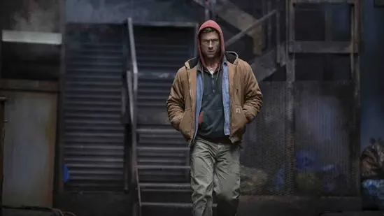 The Running Man review Glen Powell performance dystopian thriller remake Edgar Wright direction futuristic action film survival game storyline retro tech aesthetic Colman Domingo role Josh Brolin antagonist fast paced chase sequences media manipulation theme televised contest narrative analysis cinematic pacing character portrayal modern adaptation film verdict sci fi drama critical review movie insights audience reaction dystopian cinema film highlights Glen Powell movie remake details