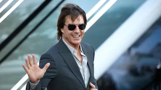 Dakota Fanning Tom Cruise birthday shoes War of the Worlds Dakota Fanning interview Tom Cruise tradition Hollywood friendship Dakota Fanning Watch What Happens Live Tom Cruise gifts Dakota Fanning shoes Tom Cruise Hollywood star Steven Spielberg film Dakota Fanning childhood role Cruise and Fanning bond celebrity news entertainment update movie co stars Paramount Plus War of the Worlds streaming Dakota Fanning All Her Fault Peacock series celebrity gifts film industry actors friendship long term tradition movie history behind the scenes story nostalgic Hollywood connection