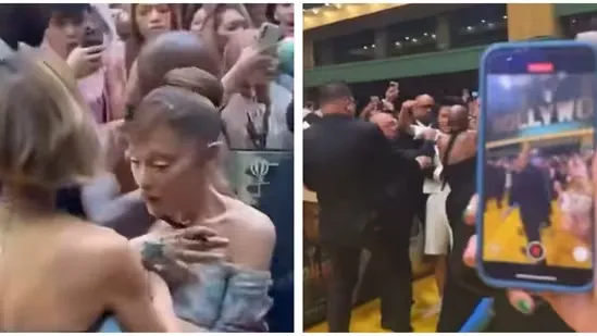 Ariana Grande Singapore premiere Ariana Grande intruder incident Cynthia Erivo protects Ariana Wicked For Good red carpet Ariana Grande security breach Singapore event chaos celebrity safety concerns Ariana Grande news Wicked For Good premiere Cynthia Erivo reaction viral video Ariana Grande fan incident online outrage event security criticism Ariana Grande latest update Jon M Chu film release celebrity red carpet incident Singapore entertainment news intruder at premiere Ariana Grande protection moment security response concerns Wicked For Good India release Ariana Grande viral incident social media reactions