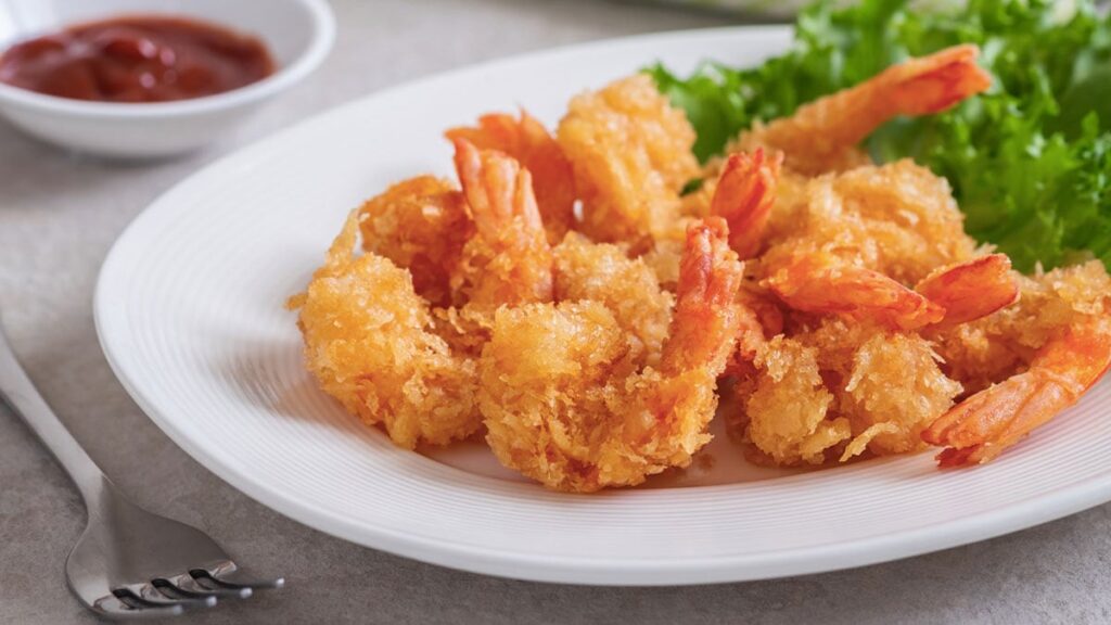 Prawn koliwada recipe Indian seafood starter crispy prawns fried prawns street food Mumbai style prawns spicy prawn appetizer besan coating prawn marination Maharashtrian recipe homemade prawn koliwada easy prawn recipe deep fried seafood Indian coastal food restaurant style prawns prawn snacks Indian appetisers festival food party starters traditional koliwada dish seafood lovers simple prawn fry best prawn