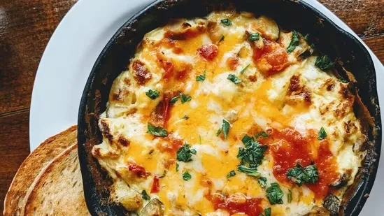 egg sadheko recipe protein rich breakfast quick breakfast idea easy egg recipe healthy morning meal high protein dish creamy egg sadheko tomato and egg recipe one pot egg breakfast nutritious breakfast option breakfast for busy mornings Indian breakfast idea flavorful egg dish homemade egg recipe Harpreet Kapoor recipe balanced meals breakfast with eggs simple skillet eggs creamy tomato base garlic egg dish comfort