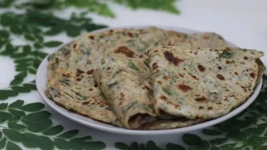 moringa paratha winter immunity recipe drumstick leaves paratha healthy winter breakfast moringa benefits winter nutrition homemade paratha recipe healthy Indian recipes skin health foods immunity boosting foods fibre rich meals winter diet ideas whole wheat paratha nutrient rich paratha moringa for kids moringa for