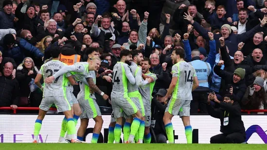 Premier League Arsenal Manchester City title race Arsenal top of the table Manchester City win Rayan Cherki goal Arsenal vs Brighton Pep Guardiola Premier League news football results Arsenal set piece goals Manchester City winning run Nottingham Forest vs Man City David Raya save Martin Odegaard goal Premier League standings football title battle English football league Arsenal points lead Manchester City pressure Liverpool resurgence Premier League match report football season update Arsenal Emirates Stadium City Ground match Guardiola celebrations Premier League champions race football headlines soccer news UK football updates