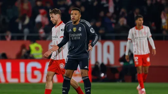 Real Madrid Girona draw Mbappe goal La Liga title race Barcelona top spot Xabi Alonso pressure Los Blancos match report Spanish football news Villarreal Real Sociedad Moleiro winner Athletic Bilbao upcoming fixtures Vinicius Jr penalty Montilivi stadium Thibaut Courtois save Spanish league standings football highlights Madrid performance Barcelona advantage Mbappe Instagram reaction Madrid away matches Spanish Super Cup impact Real Betis Sevilla derby suspension La Liga weekend results football analysis Spain sports update Girona strong defense Azzedine Ounahi opener Madrid challenges title contenders Villarreal momentum Soler equalizer Barrenetxea free kick Madrid fans concern Barcelona championship push