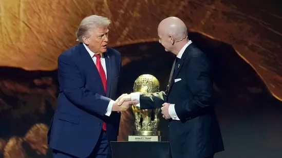 FIFA Peace Prize Donald Trump 2025 FIFA World Cup draw FIFA peace award inaugural peace prize global unity football diplomacy Gianni Infantino award ceremony Trump peace prize news football news world cup 2026 draw Washington DC peace trophy sports politics peace efforts global peace award world football organisation peace through sport controversy reaction to prize international news Trump FIFA 2026