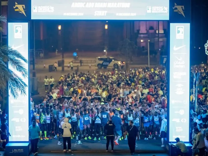 ADNOC Abu Dhabi Marathon Abu Dhabi running event Zayed Sports City marathon UAE sports weekend Dubai Abu Dhabi fitness Abu Dhabi family events ADNOC Marathon 2025 marathon registration race day marathon village AI-powered Pace Lab endurance challenge power test reaction test stretch recovery zone Normatec gear marathon relay