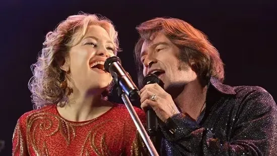 Song Sung Blue review Hugh Jackman movie Kate Hudson film Neil Diamond tribute movie musical drama film review 2026 Hollywood movie Craig Brewer director true story film music based movie emotional drama Hugh Jackman performance Kate Hudson performance Neil Diamond songs tribute band movie Lightning