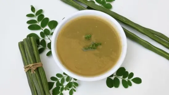 moringa drumstick soup moringa leaf soup winter immunity drink December cold home remedy Indian winter soup green superfood drink moringa benefits immunity boosting soup digestive health winter diet traditional Indian food moringa leaves nutrition drumstick tree soup natural immunity winter wellness
