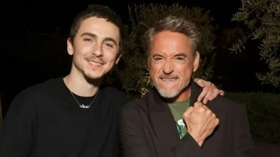 Robert Downey Jr Timothee Chalamet Dunesday Dune Part Three Avengers Doomsday December 2026 movie release Hollywood box office clash Barbenheimer comparison Marvel Studios Dune franchise Denis Villeneuve Russo Brothers blockbuster films upcoming movies 2026 sci fi movies superhero movies box