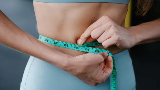 weight loss 2026 sustainable weight loss fitness coach tips lose 20 pounds healthy weight loss plan calorie deficit formula daily walking benefits 7000 steps a day protein intake for weight loss strength training for fat loss lifting heavy benefits long term fitness goals sustainable dieting habits realistic fitness resolutions fat