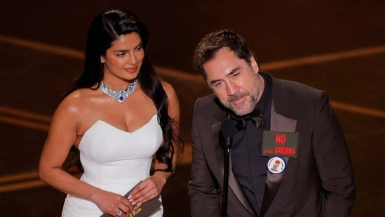 Javier Bardem Free Palestine Oscars 2026 Priyanka Chopra Oscars 2026 Javier Bardem political statement Oscars 98th Academy Awards highlights Priyanka Chopra Javier Bardem stage moment Oscars 2026 controversy Oscars political message Hollywood awards ceremony news Javier Bardem speech Oscars