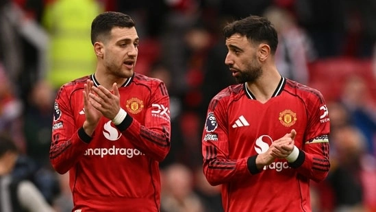 Manchester United vs Aston Villa Manchester United win Premier League Manchester United Champions League race Aston Villa loss Manchester United match result Bruno Fernandes assist record Casemiro goal