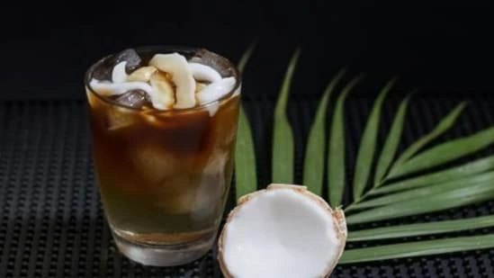 coconut water coffee viral drink pre workout drink coconut water coffee benefits fitness drink trend coconut water coffee recipe healthy morning drink workout hydration drink caffeine and electrolytes drink coconut water benefits fitness coffee pre workout benefits