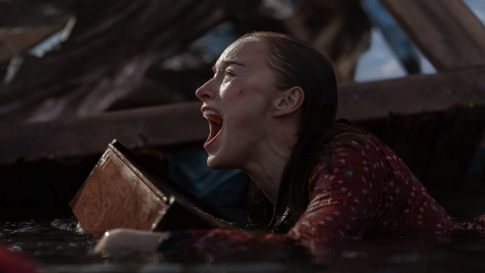 Thrash movie review Netflix Thrash film 2026 Netflix shark movie Thrash Phoebe Dynevor movie review Thrash Netflix cast Thrash movie plot explained shark thriller Netflix 2026 disaster movie shark attack film